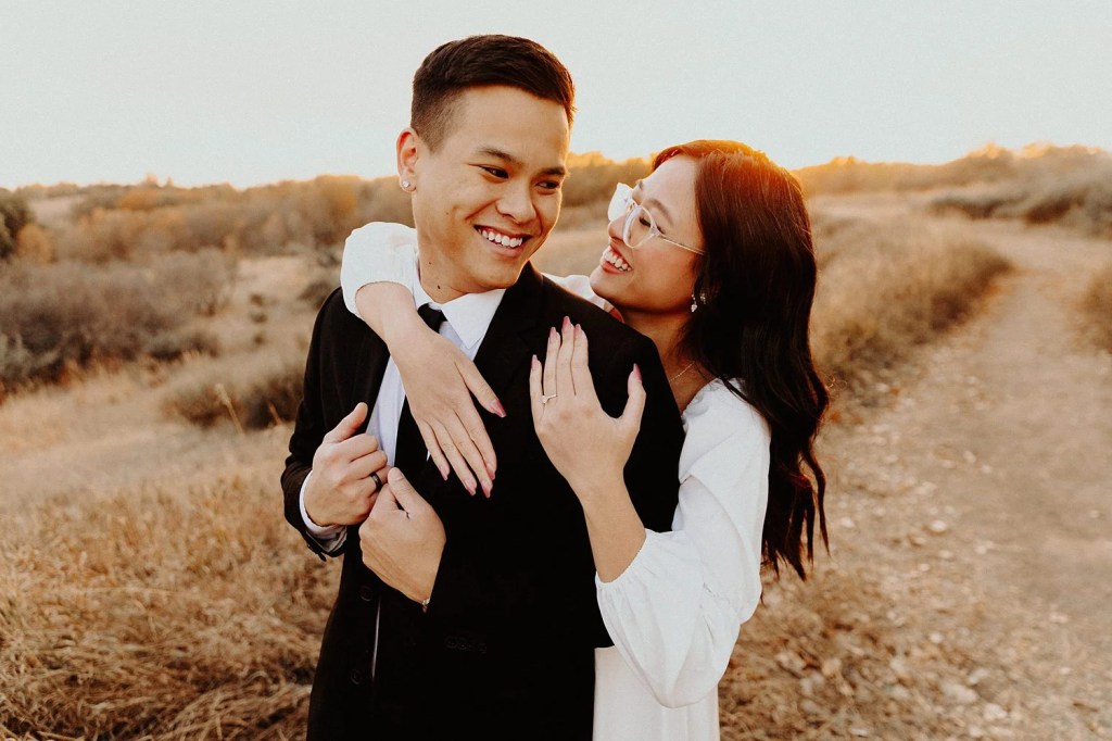 A beautiful couple hugged each other in Griffith Park.